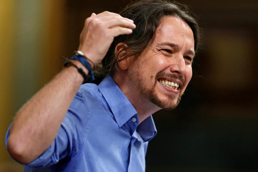 Podemos party leader Iglesias delivers a speech during an investiture debate at parliament in Madrid
