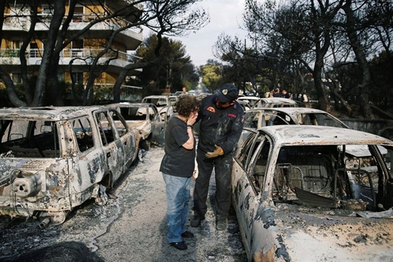 Afectados por los incendios en Grecia. / EP