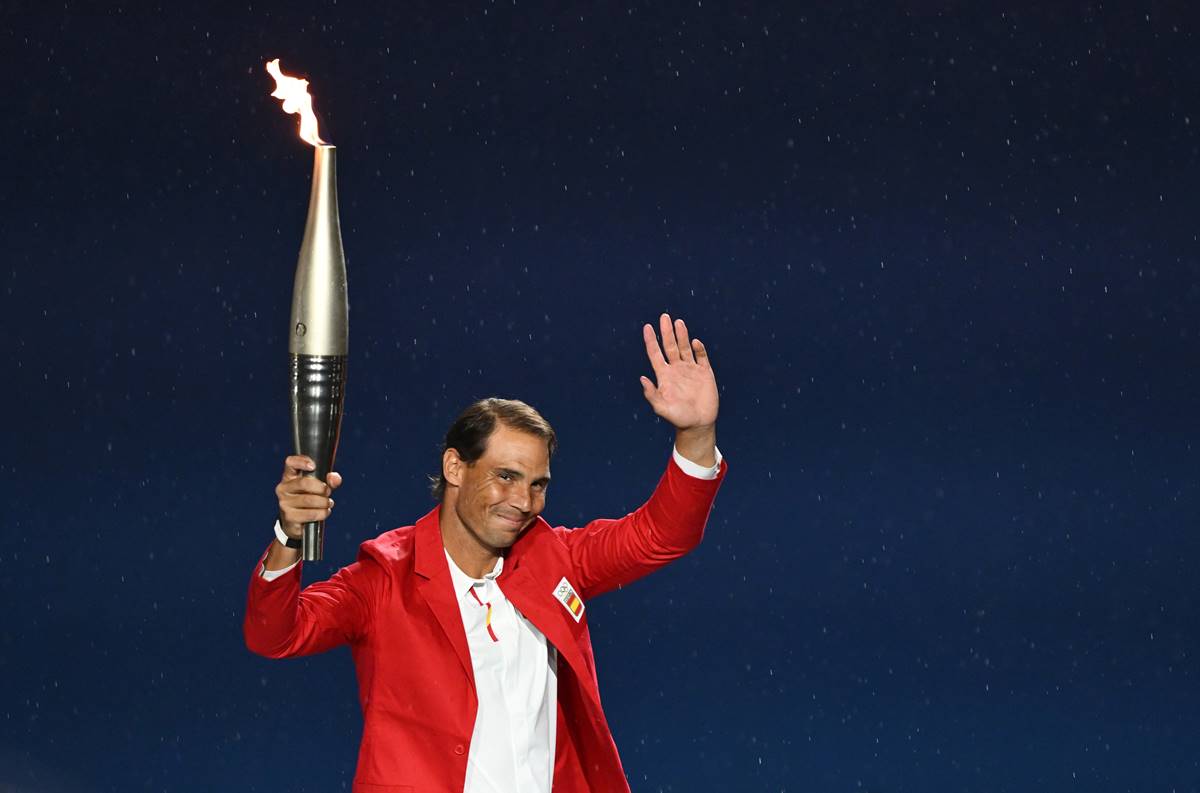 La llama olímpica llega a París, que se rinde a Rafa Nadal